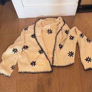 THE GREAT. Cream Sweater with Black Floral Pattern